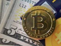 比特币突破47000万美元 一枚比特币可换一斤半黄金