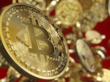 首次突破52000美元！这些上市公司官宣持有比特币